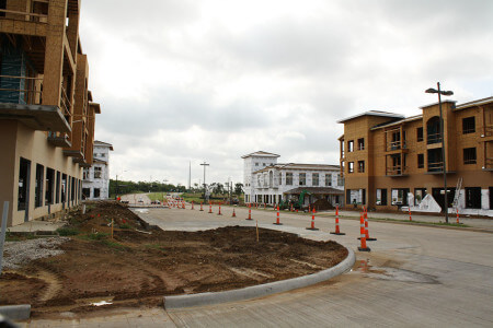 The Shops at Lakeside will occupy the ground floor of six buildings along Lakeside Parkway at FM 2499. Lofts will occupy the upper floors. FM 2499 can be seen in the distance.