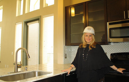 JoAnne Griffin of Elan Lakeside on a "hard hat" tour of the lofts units in Building 1. 