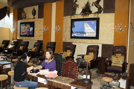 Large televisions and leather seats and recliners stand out in the interior of the Fort Worth spa. 