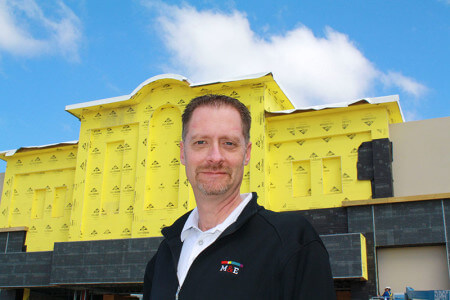 Mark McLaughlin, director of operation for the Moviehouse & Eatery, in front of the Lakeside theater.